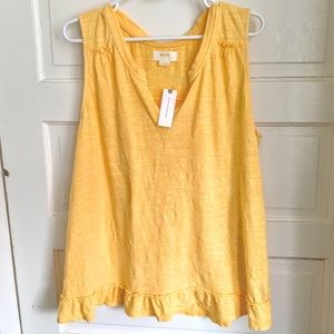 Yellow Anthropologie top w/ split ruffled back 🌼